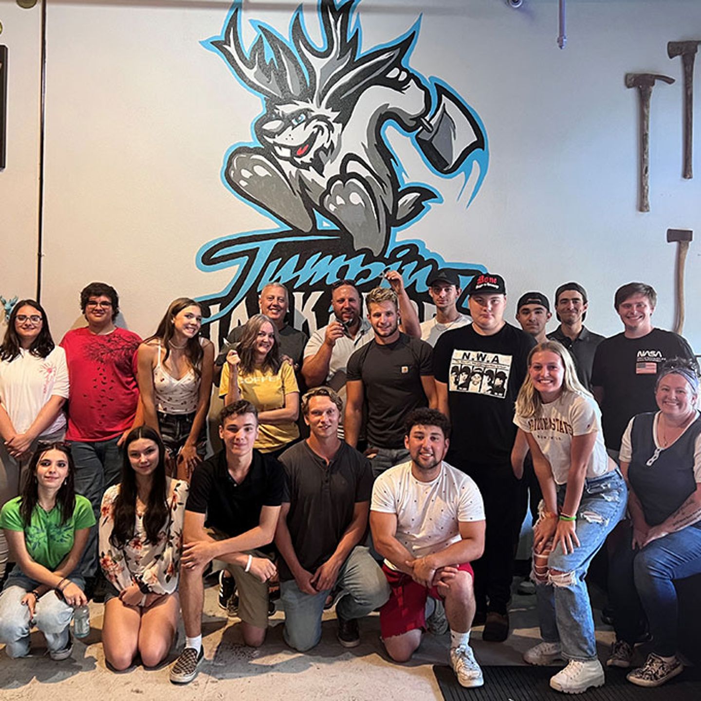 Group Posing in Axe Throwing Venue