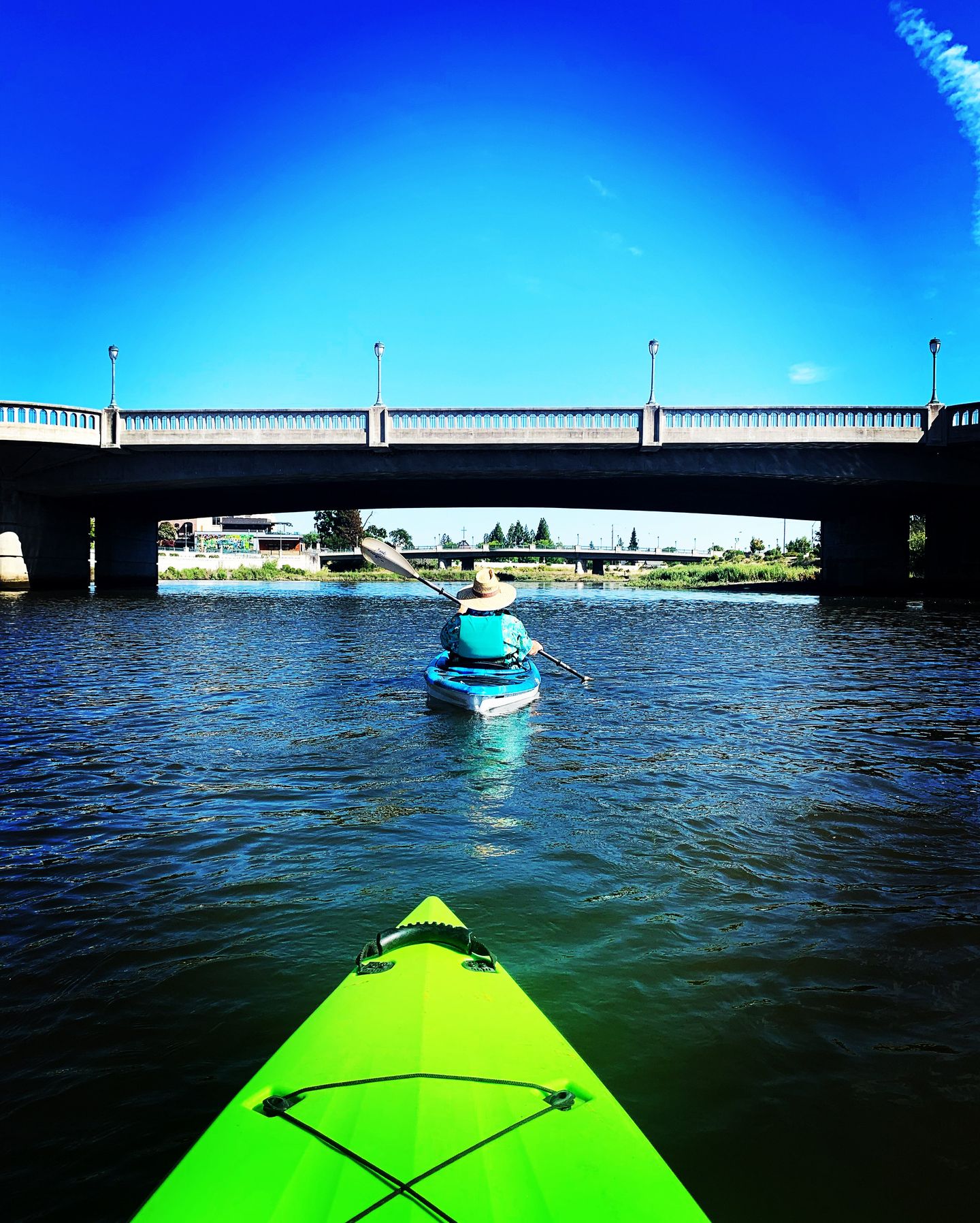 Kayaking under bridge