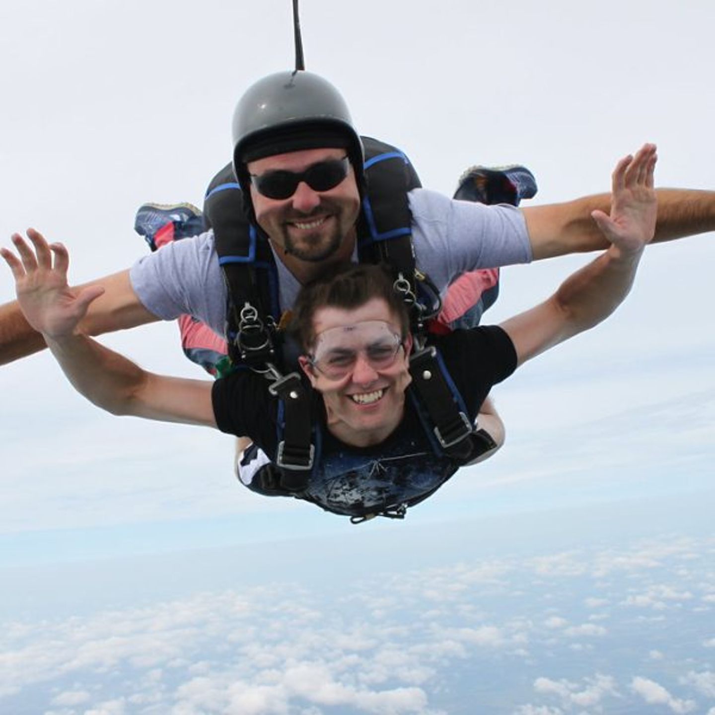 Two people jumping