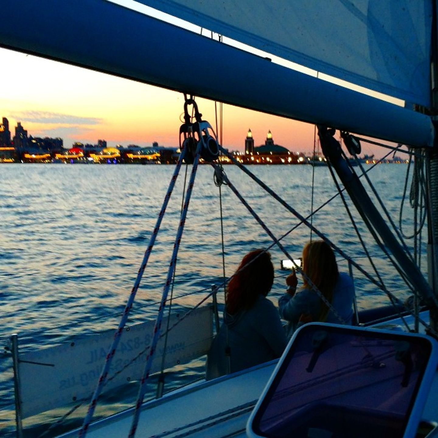 Group on Water at Sunset