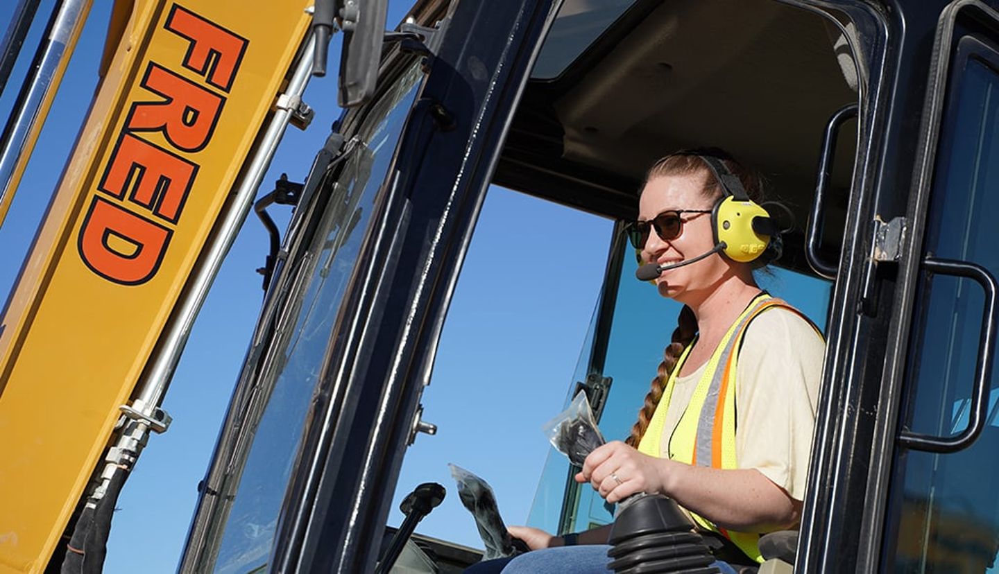 Woman Operating Excavator