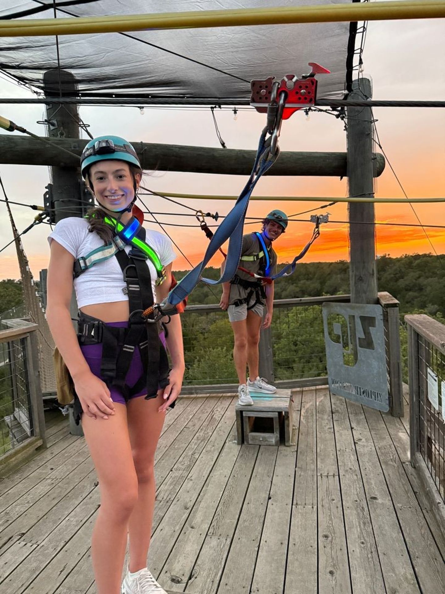 Couple Ziplining at Sunset