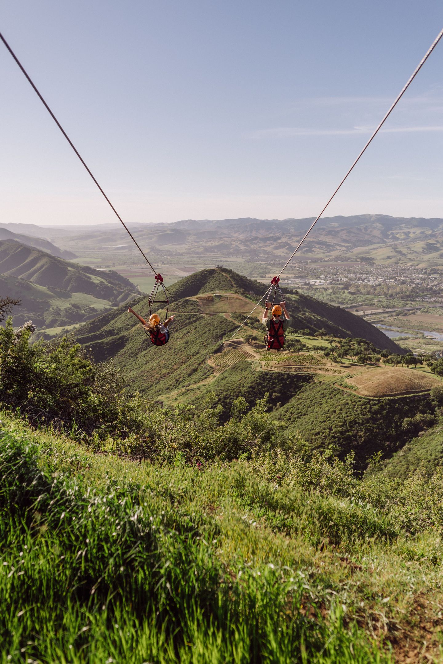 Zipliners going down mountain