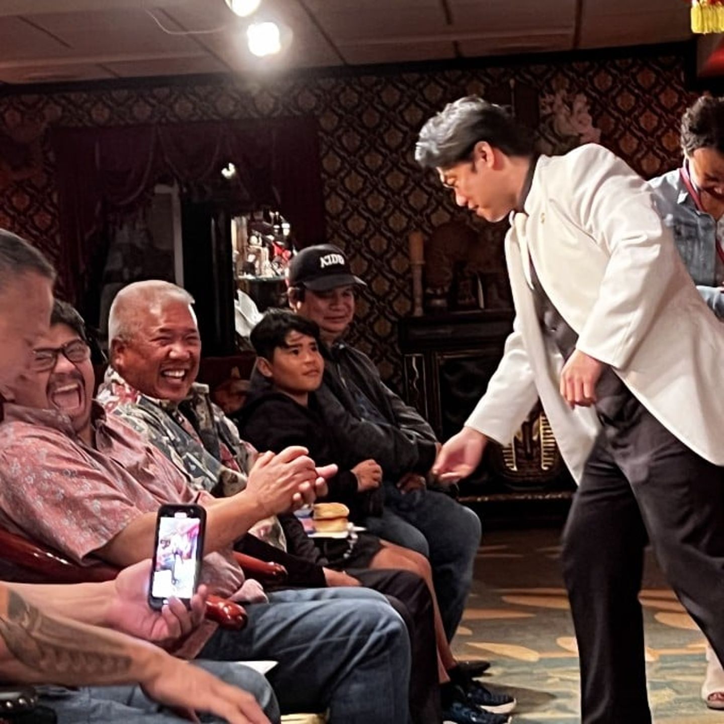 Magician with audience