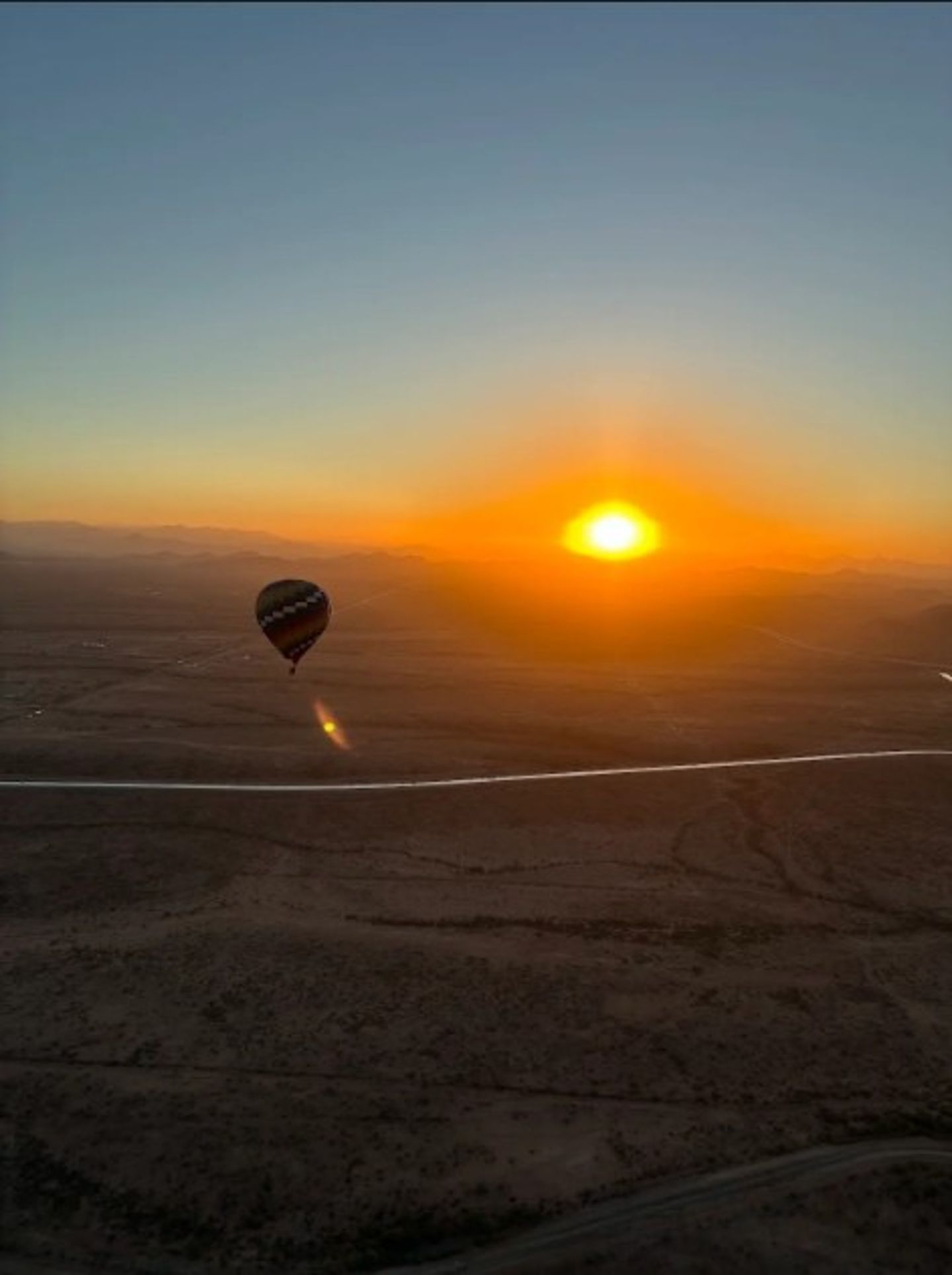 Balloon at sunset