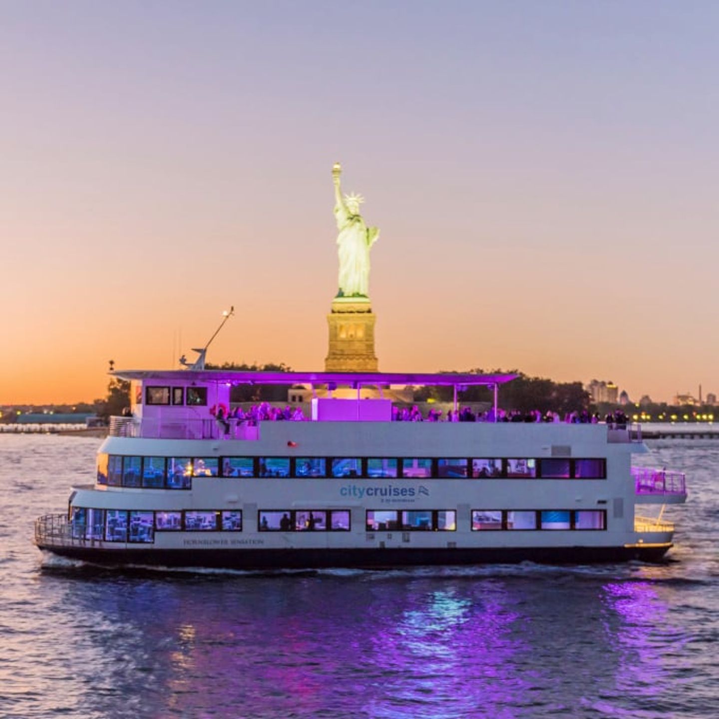Boat in front of Statue of Liberty