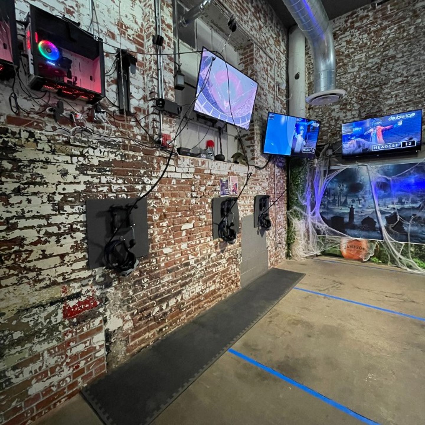 Room with Multiple Tv's and Gaming Equipment