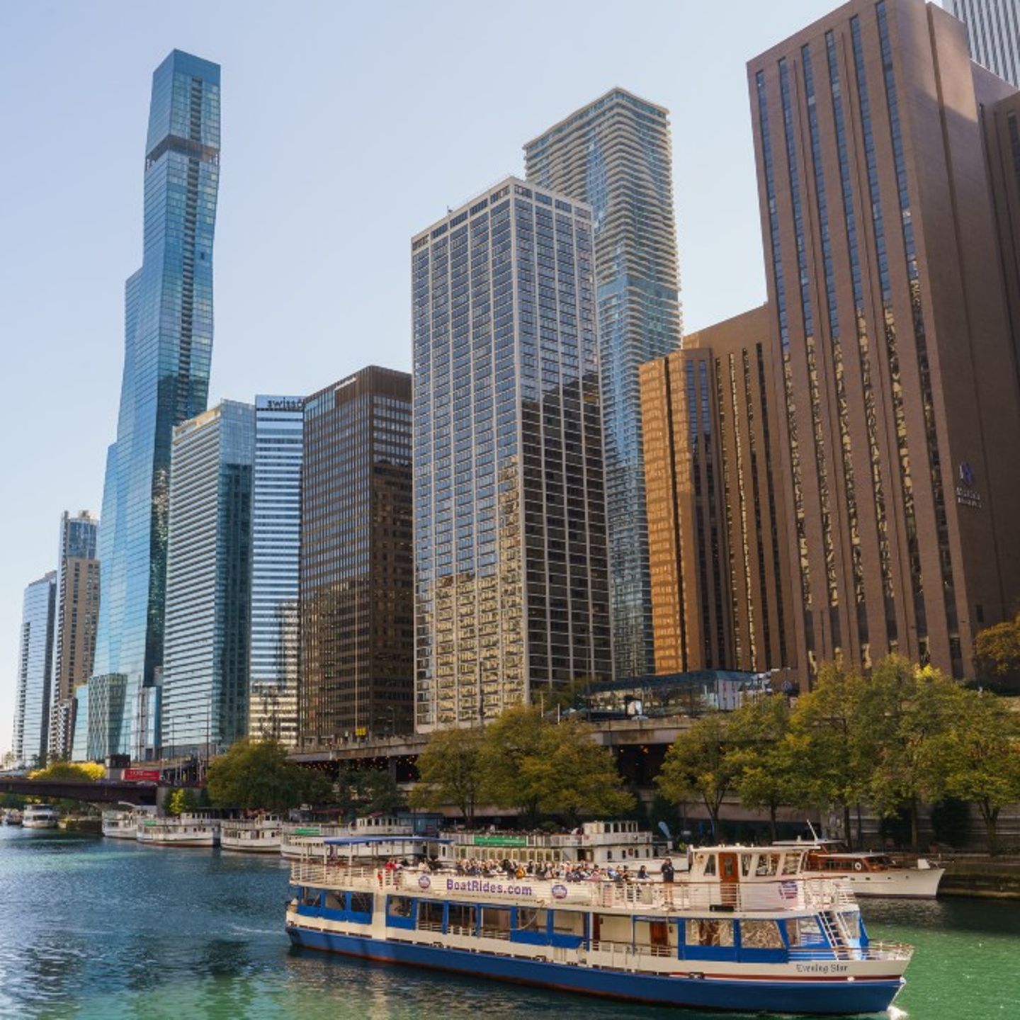 Boat sailing along city line