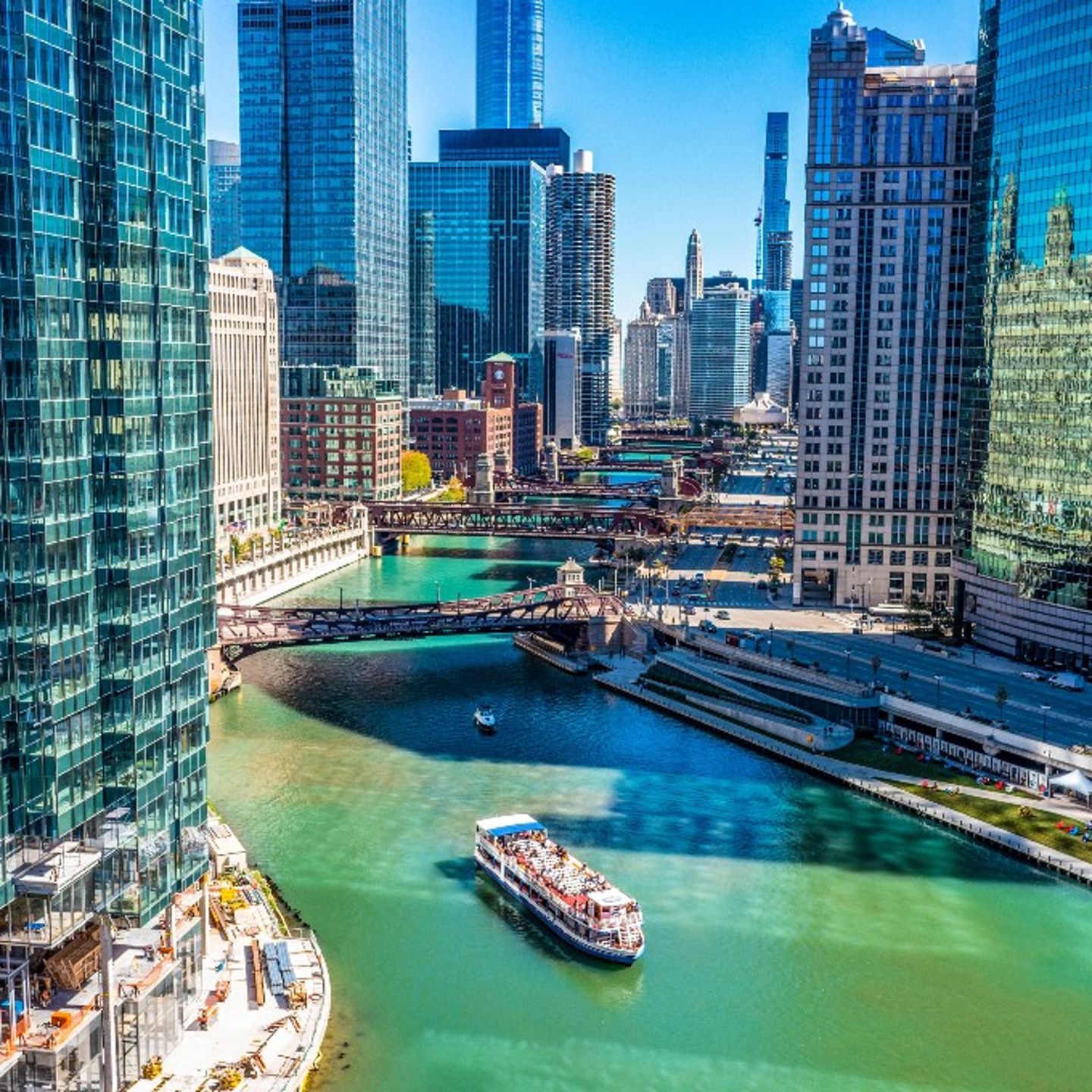Boat on river through city
