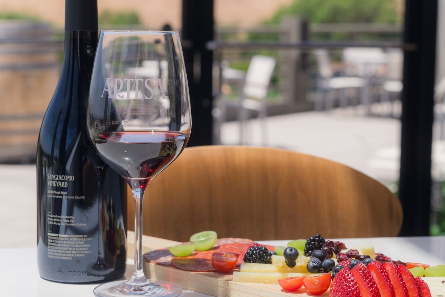 Wine with cheese and fruit board