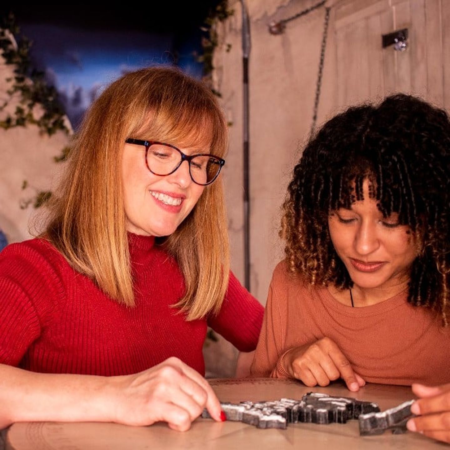 Two Girls Solving Puzzle