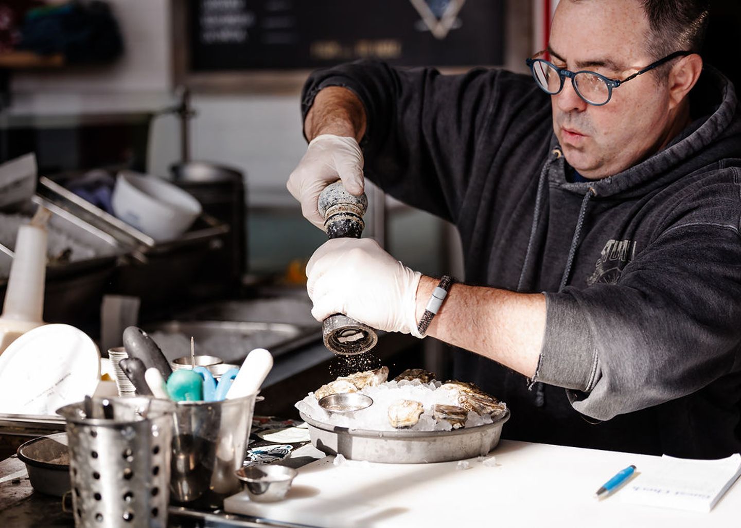 Oysters being salted