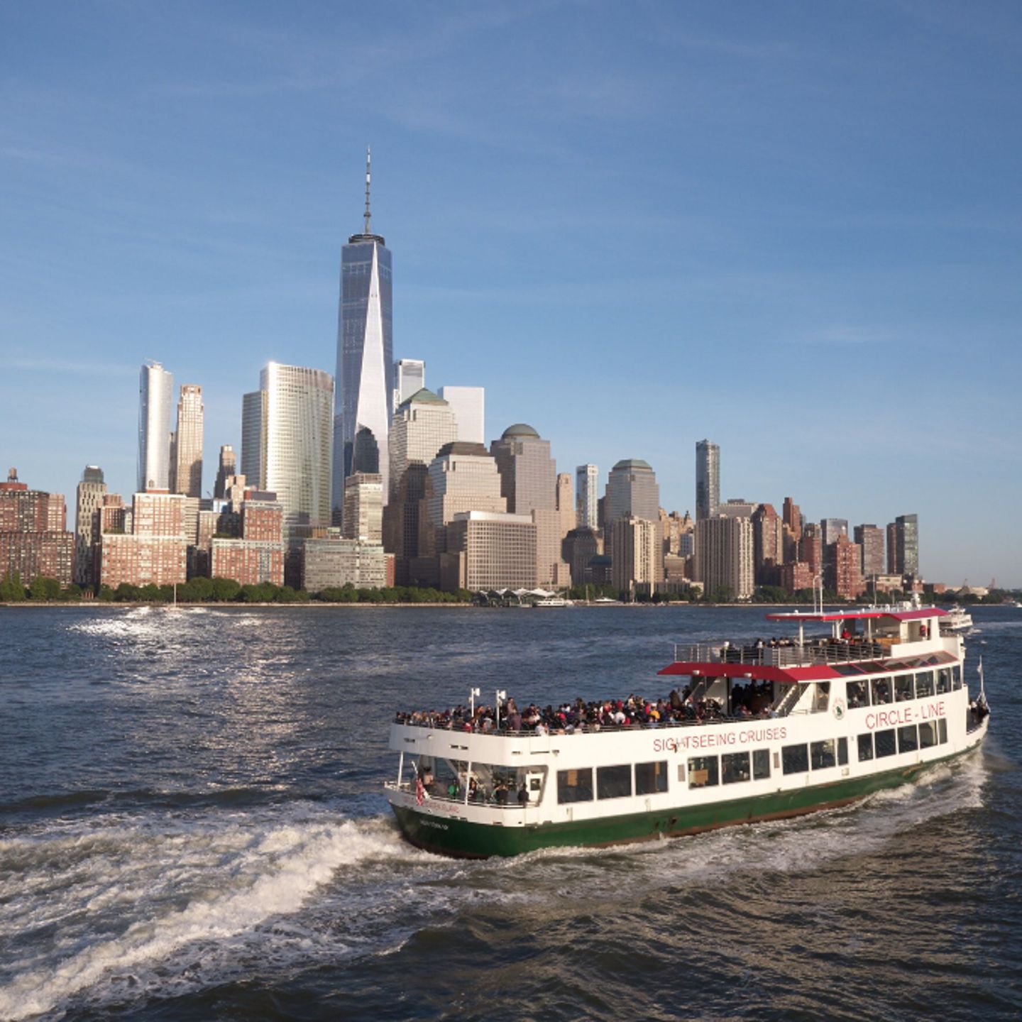 Boat in front of city