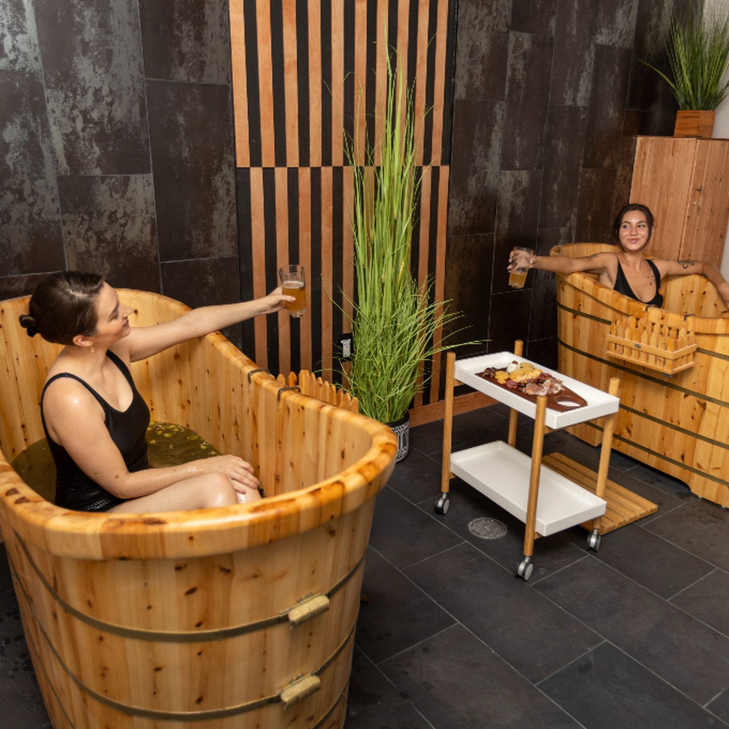 Two women in tubs
