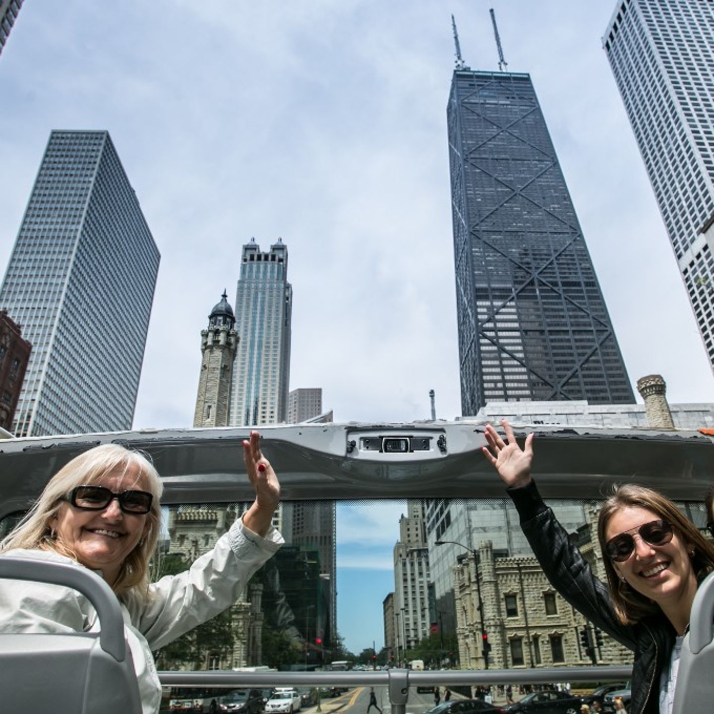 Two people posing with Willis Tower