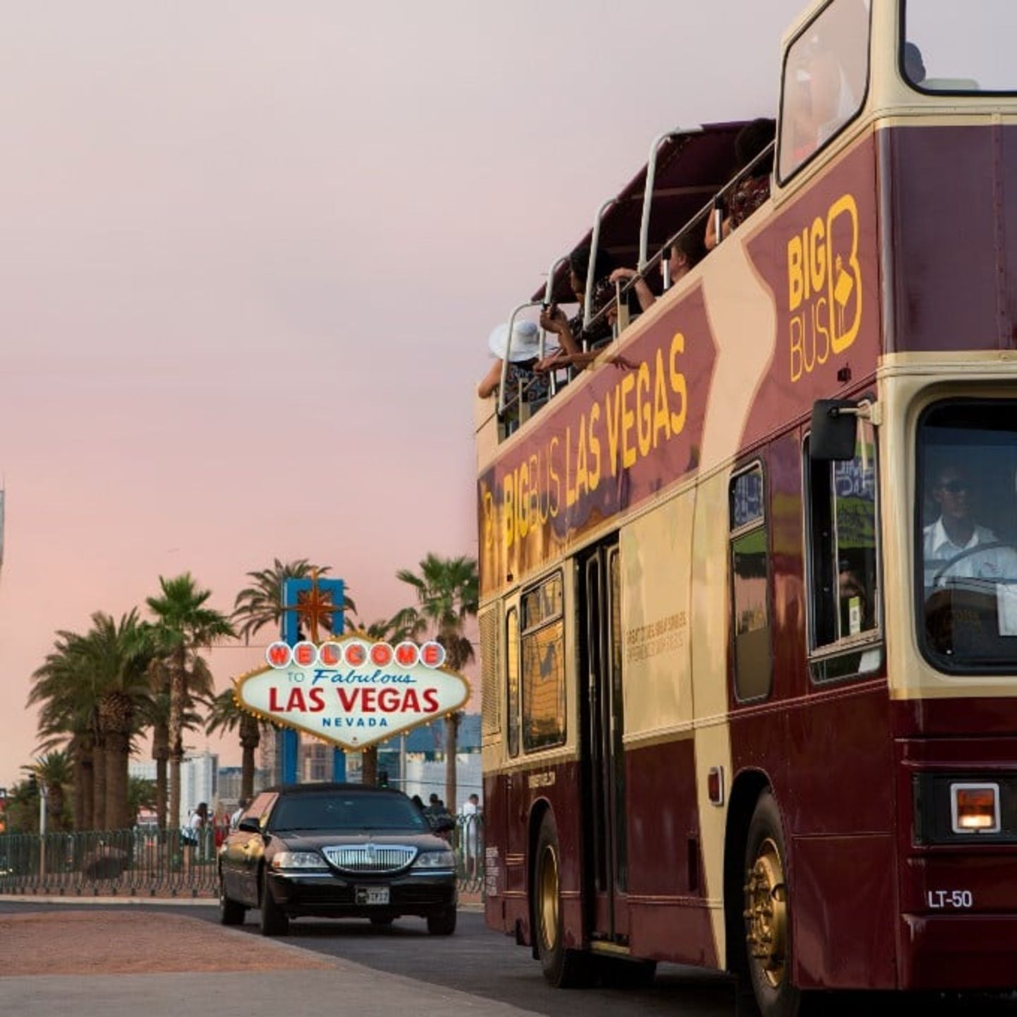 Bus in front of sign
