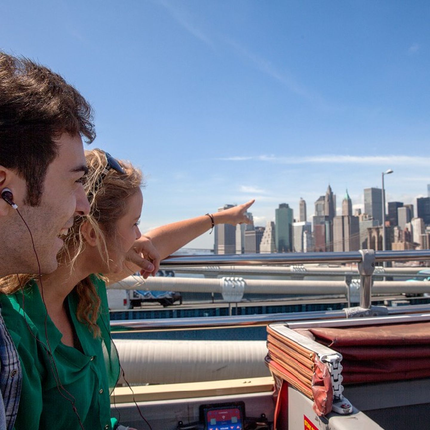 Couple pointing at view