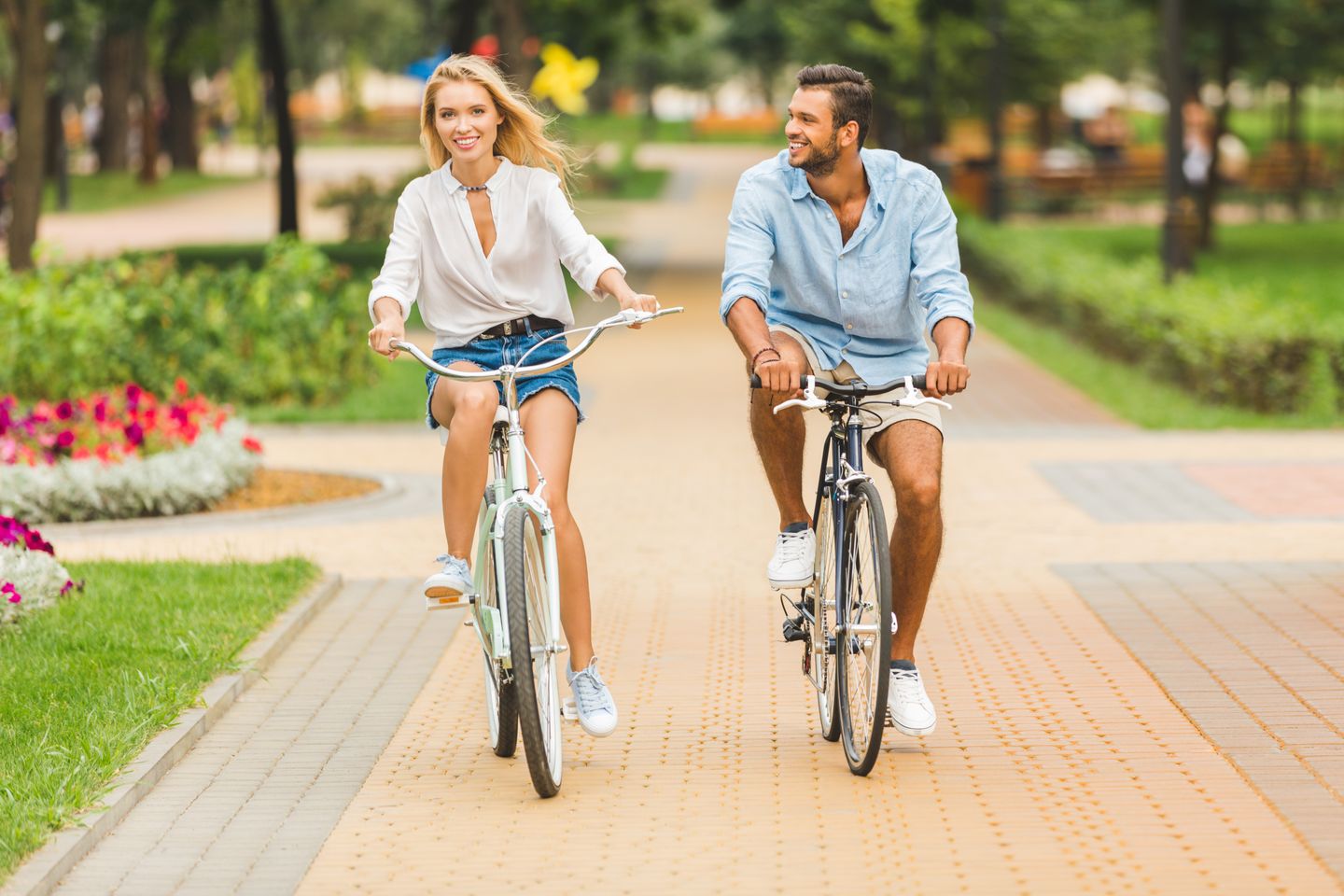 Couple riding bikes