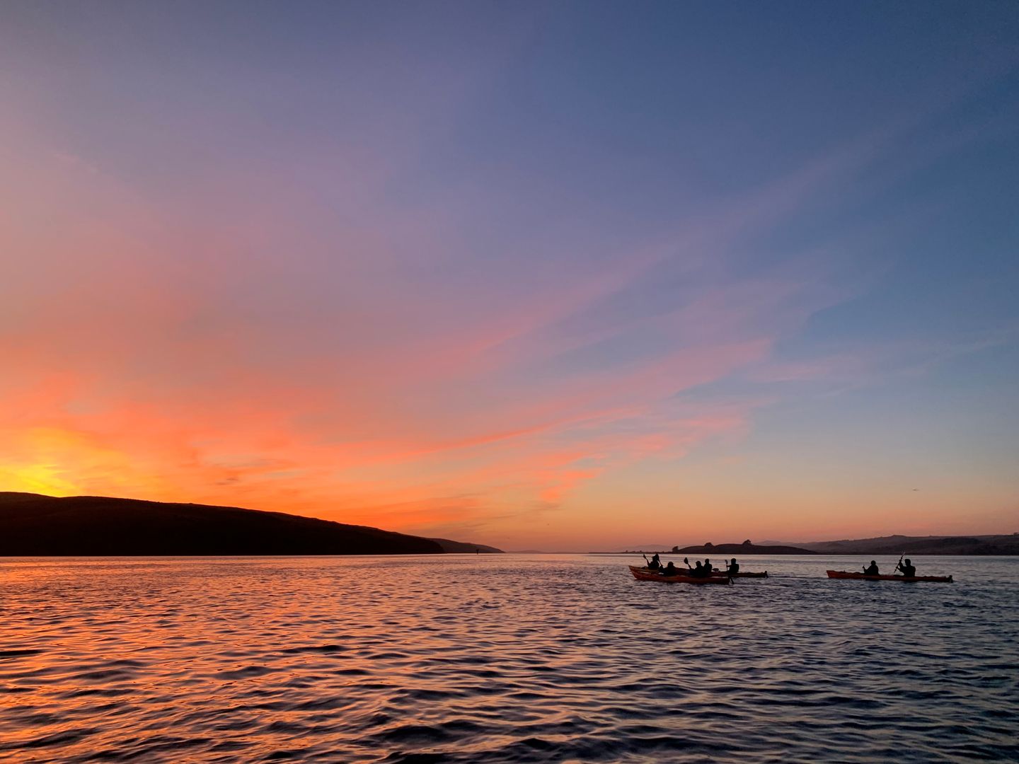 Kayaks at sunset