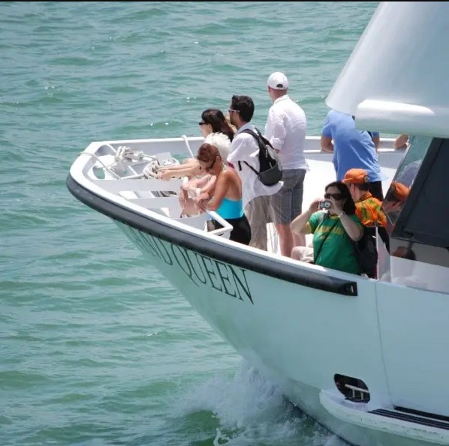 People at boat helm