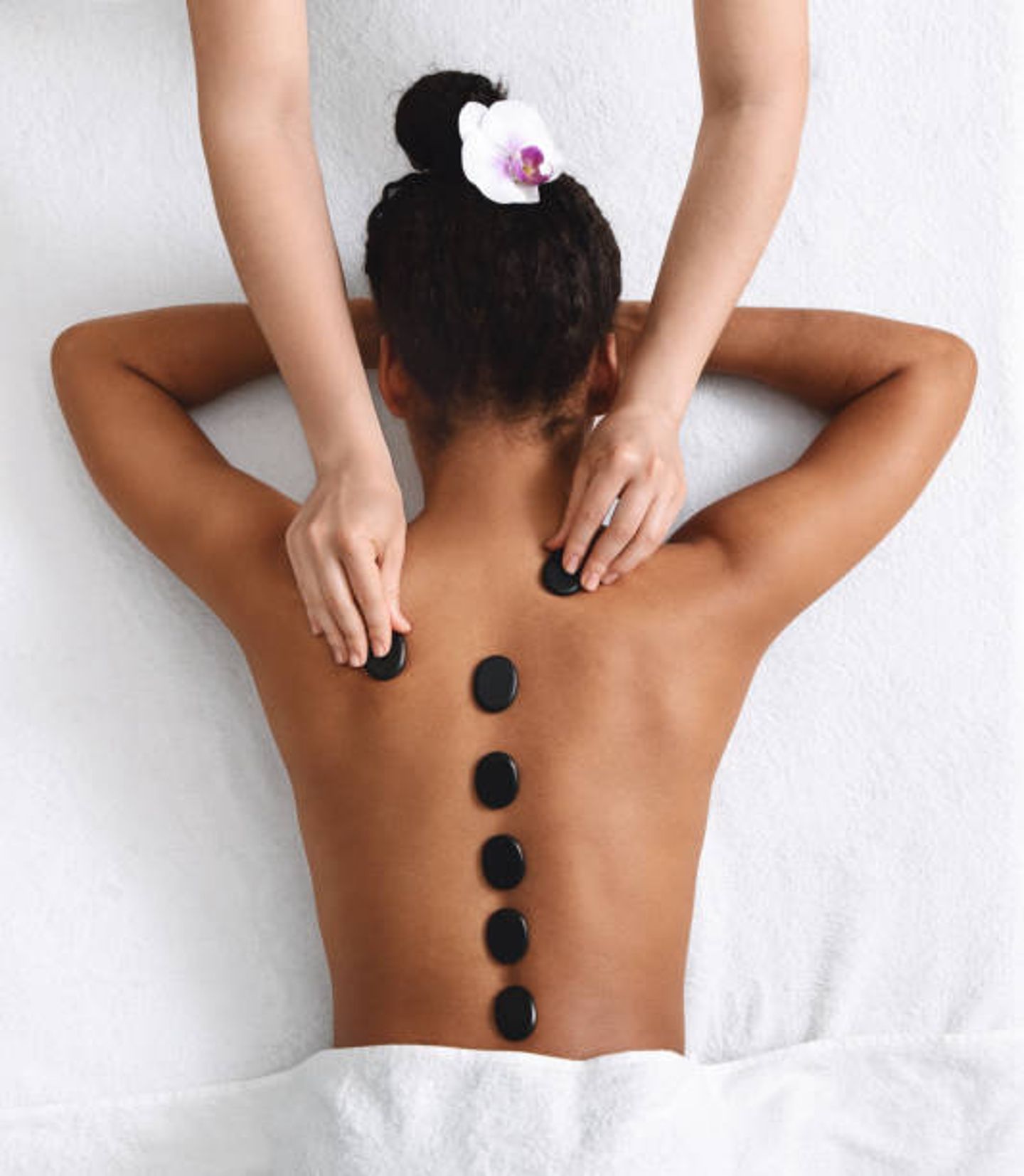 Hot stones on back
