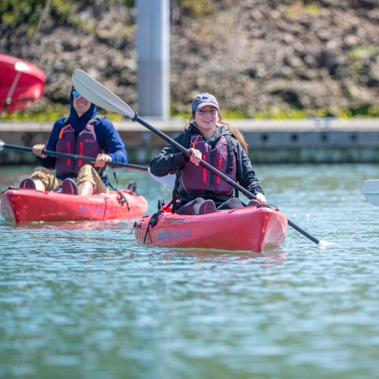 Two people paddling