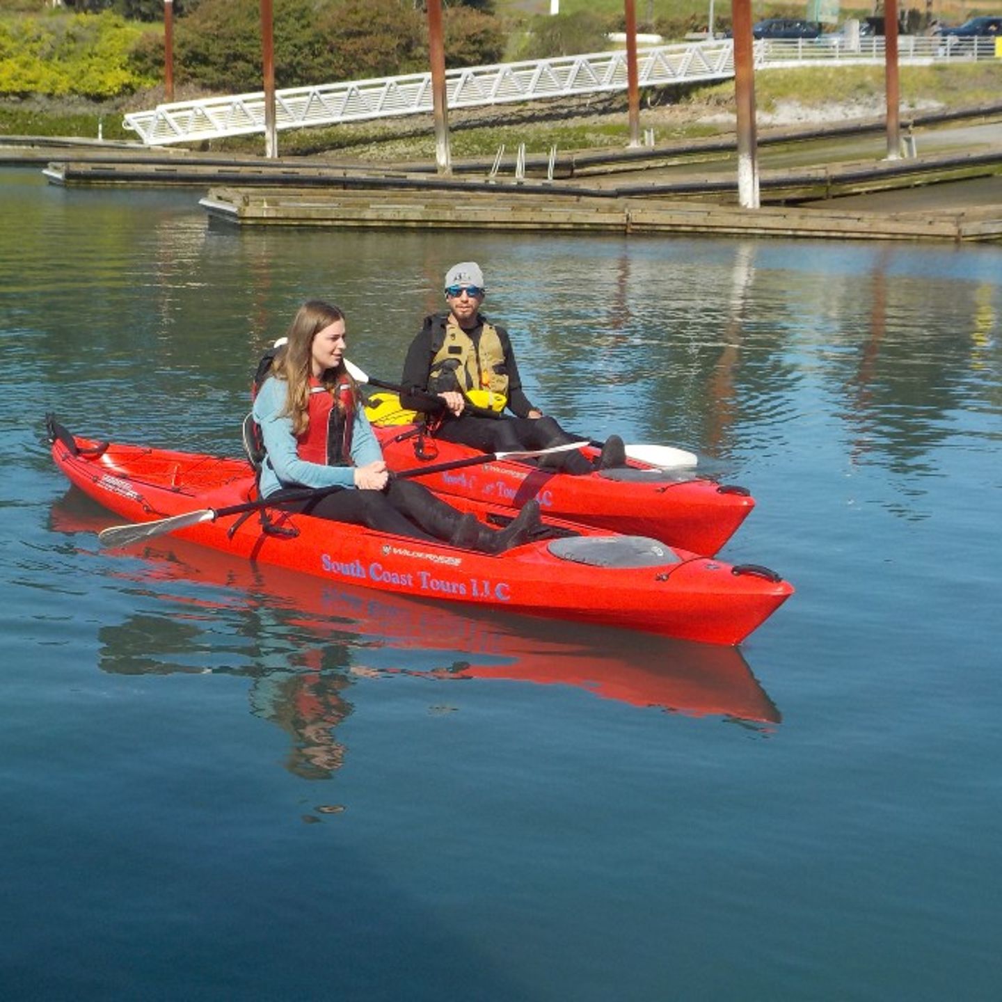 Two people on kayak on water