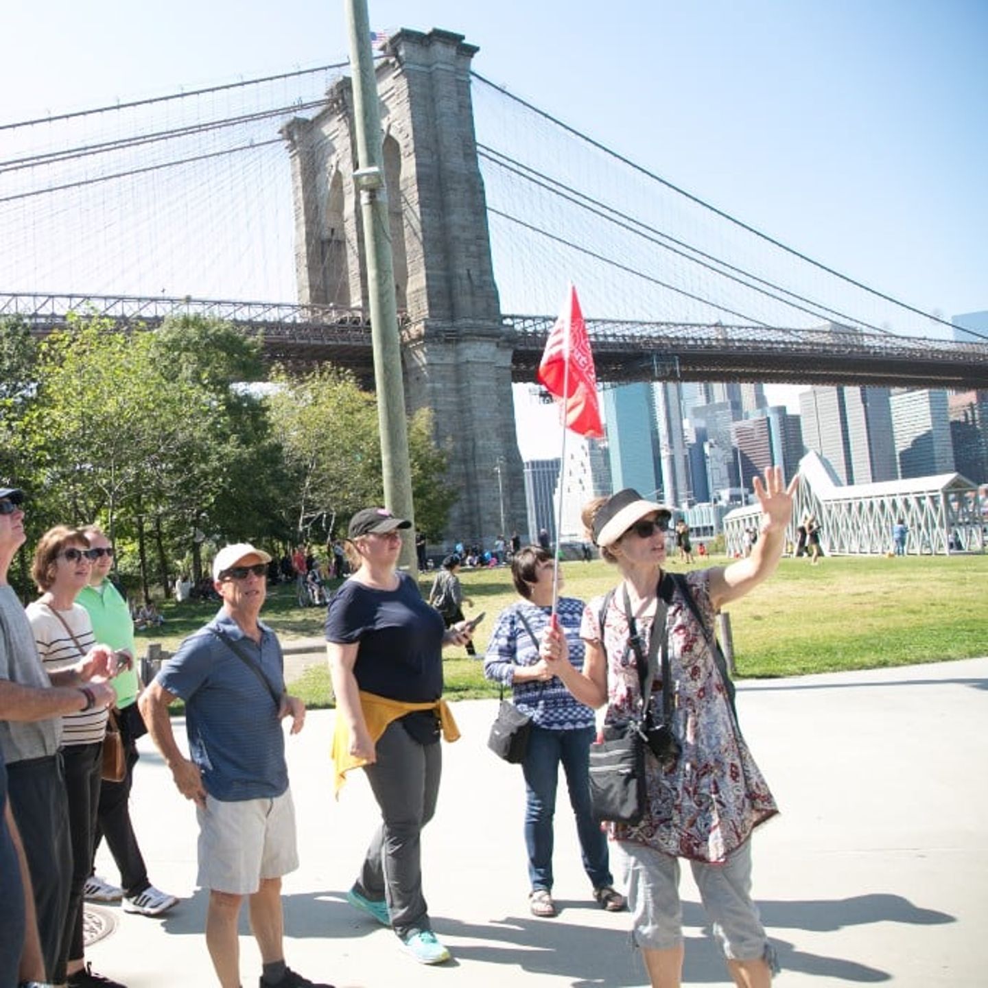 Group selfie with bridge