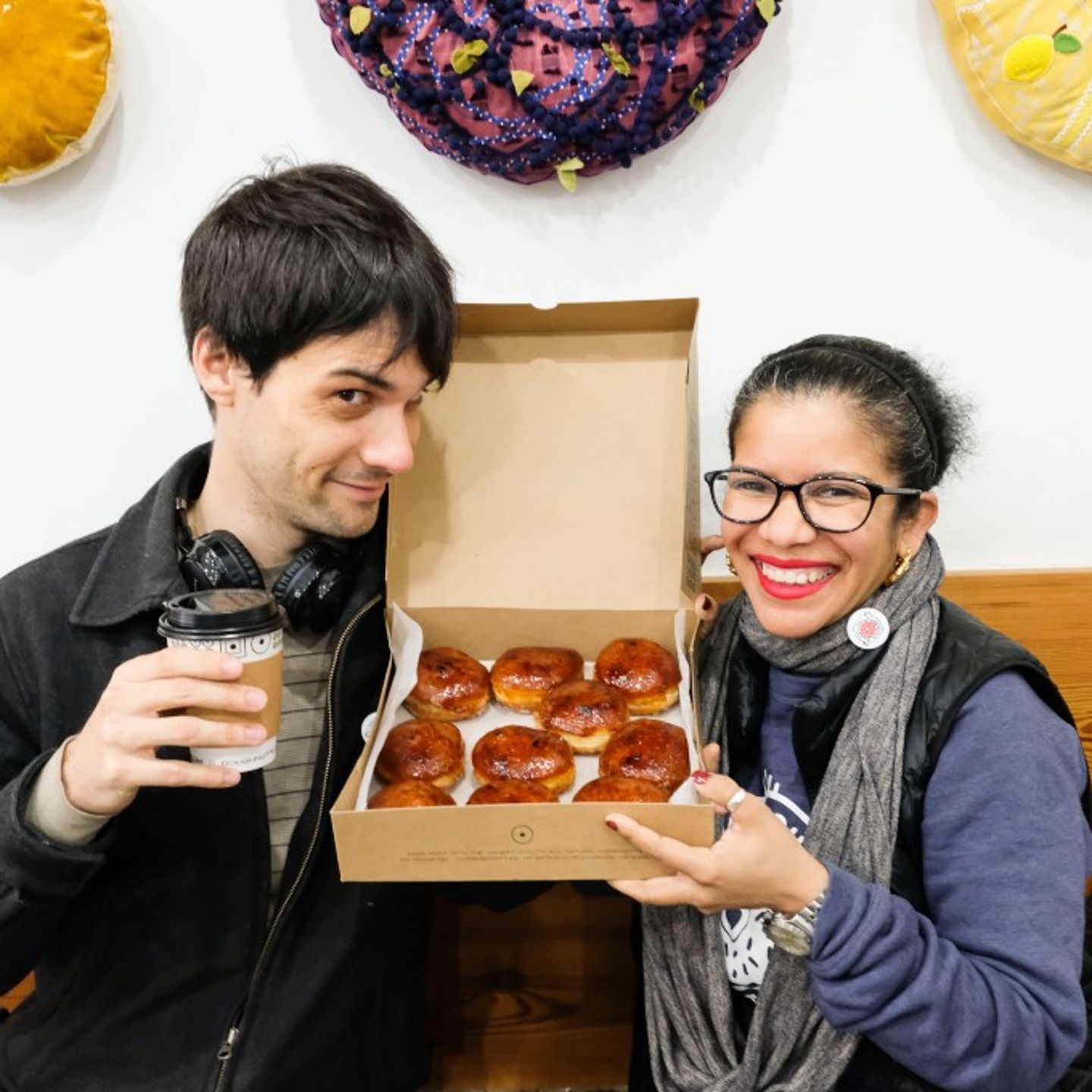 People Posing with Box of Donuts