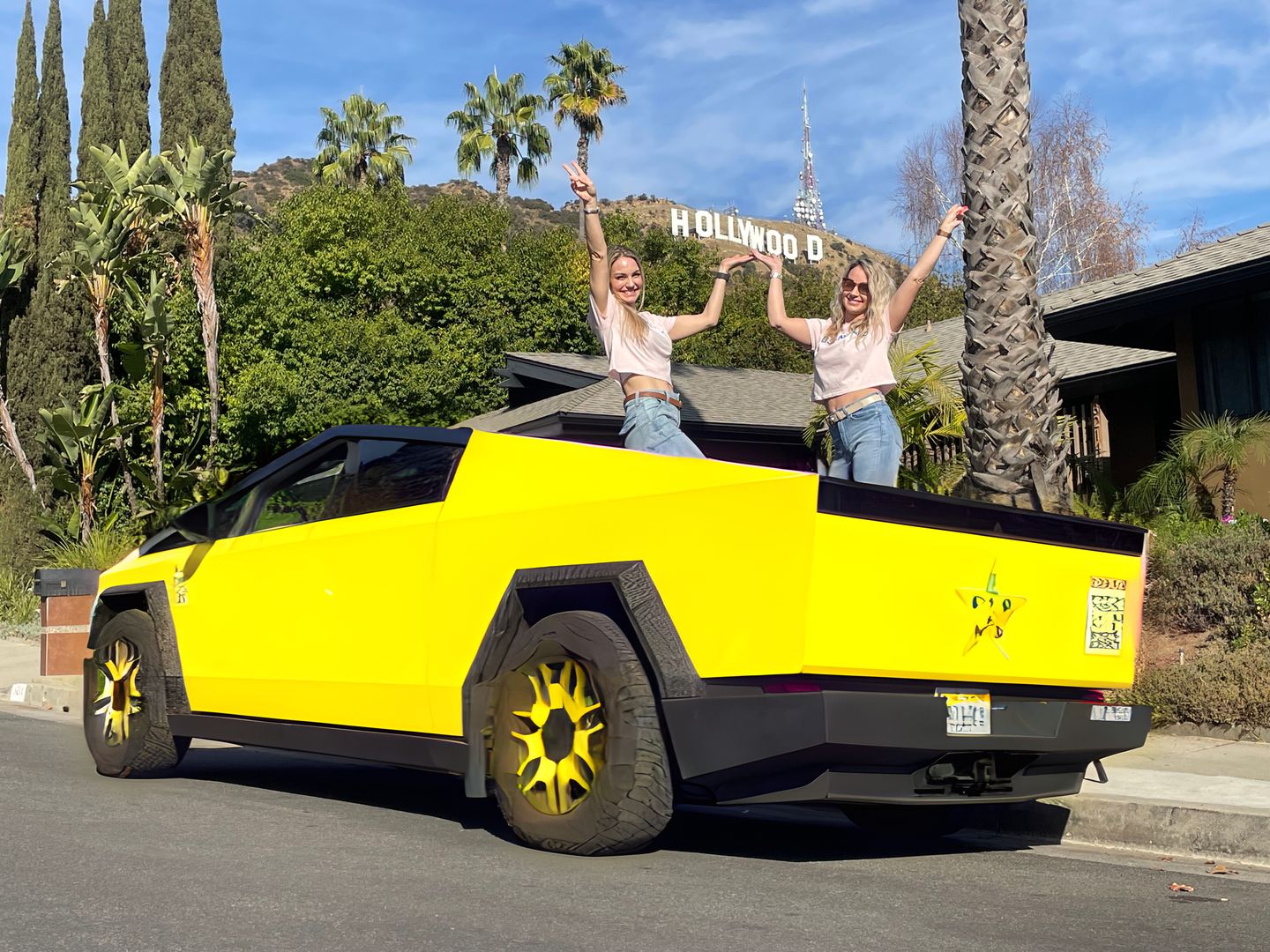 Two girls in Cybertruck