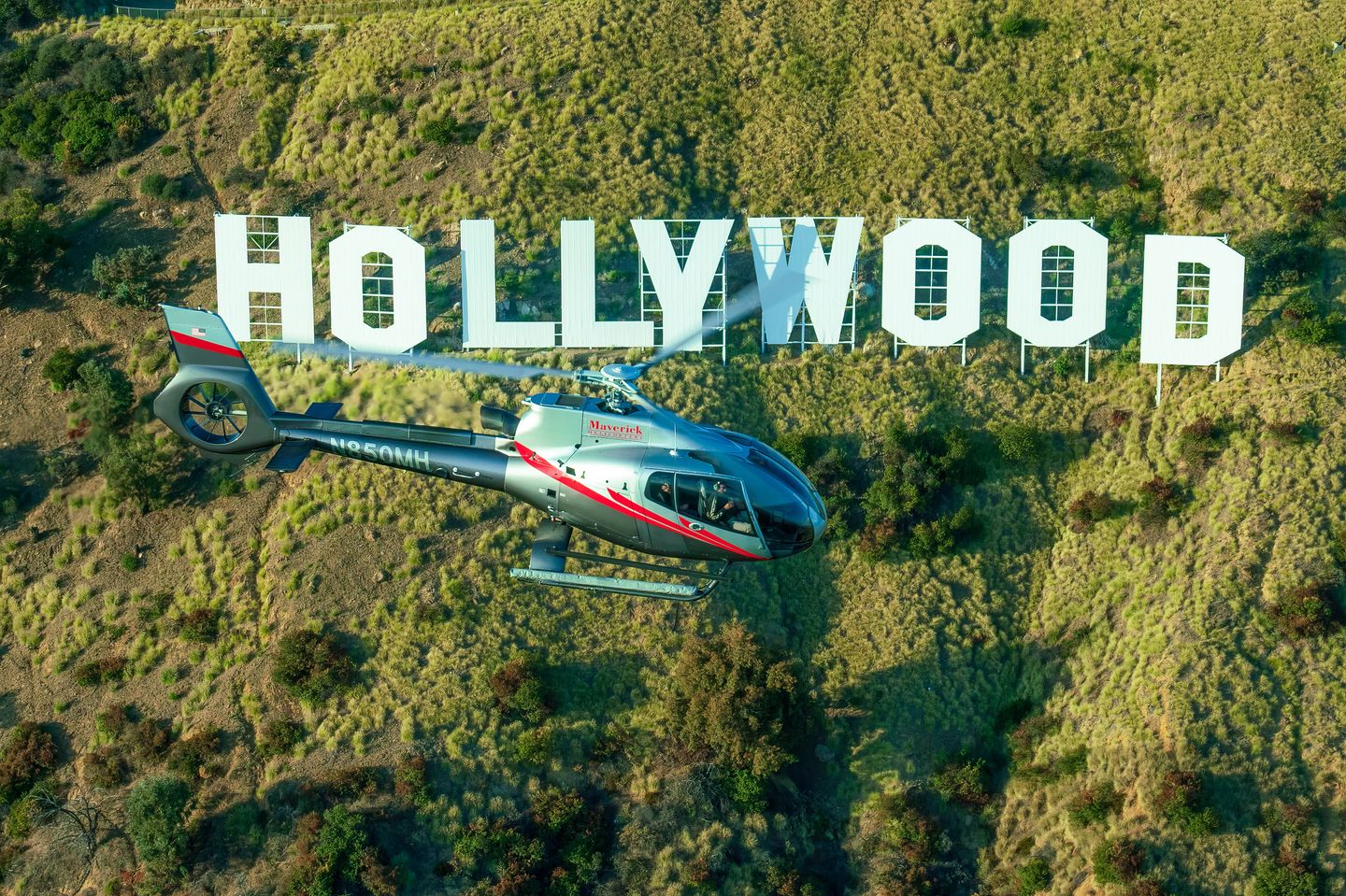 Helicopter with Hollywood sign