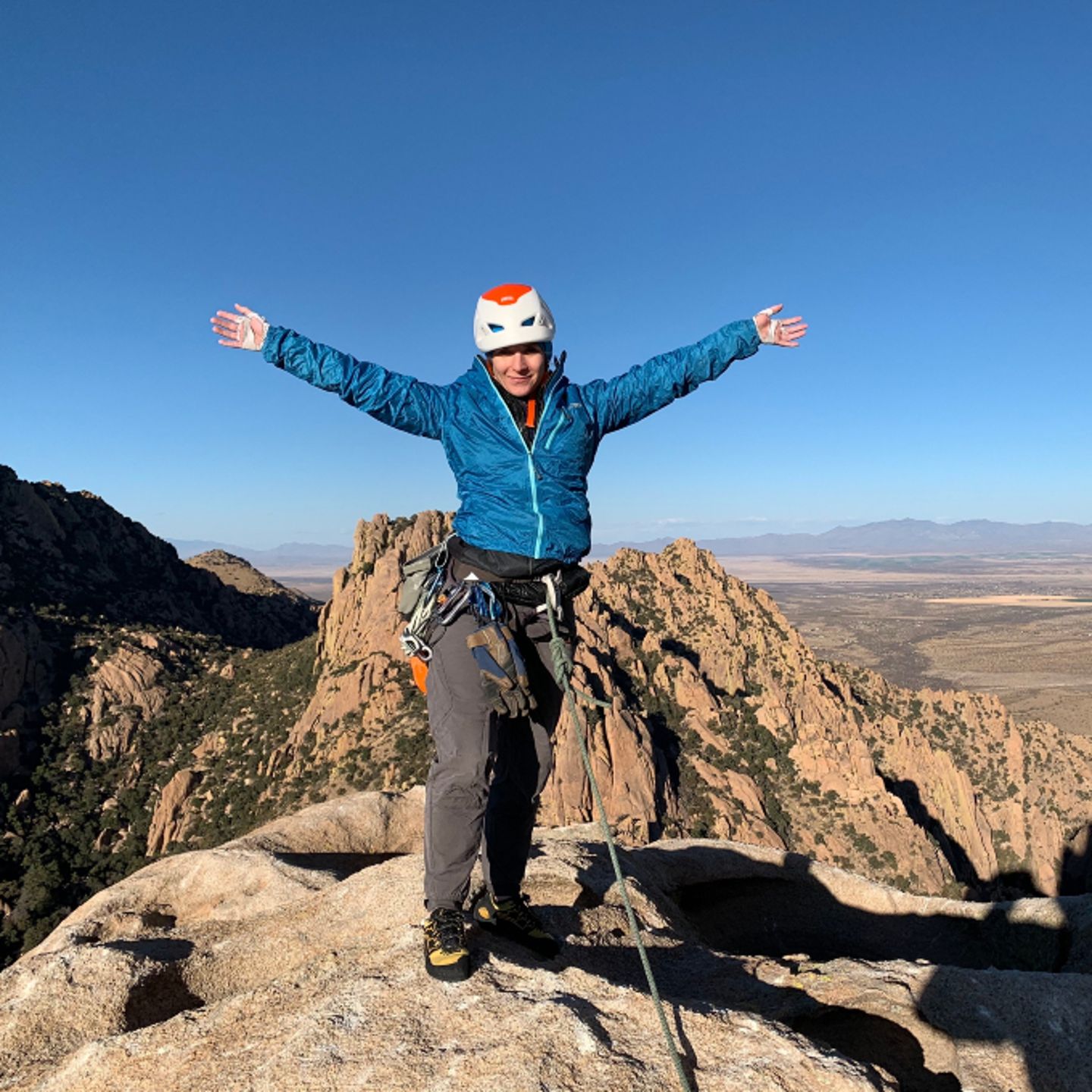 Woman on top of rock