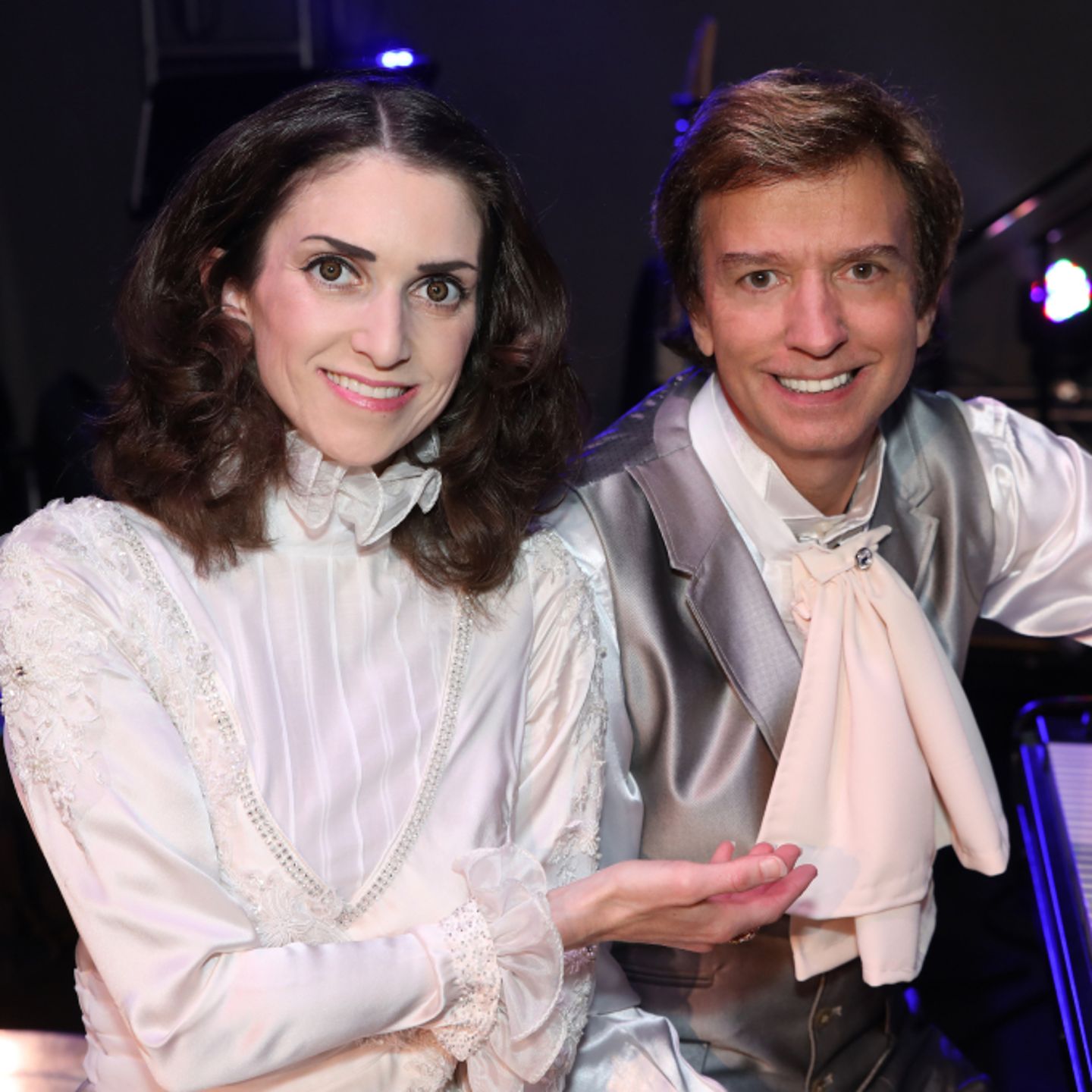 Two people sitting together