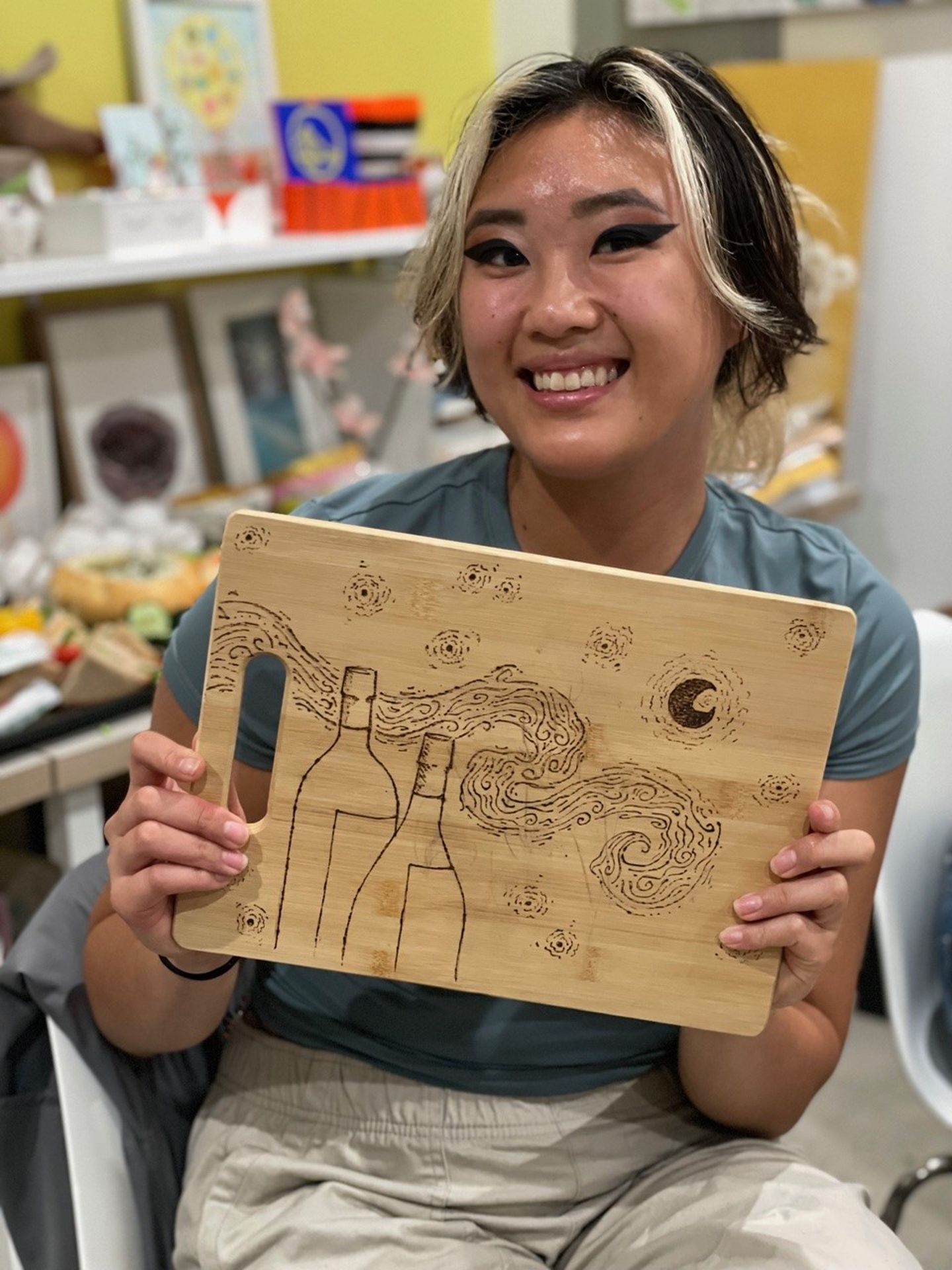 Woman holding cheeseboard