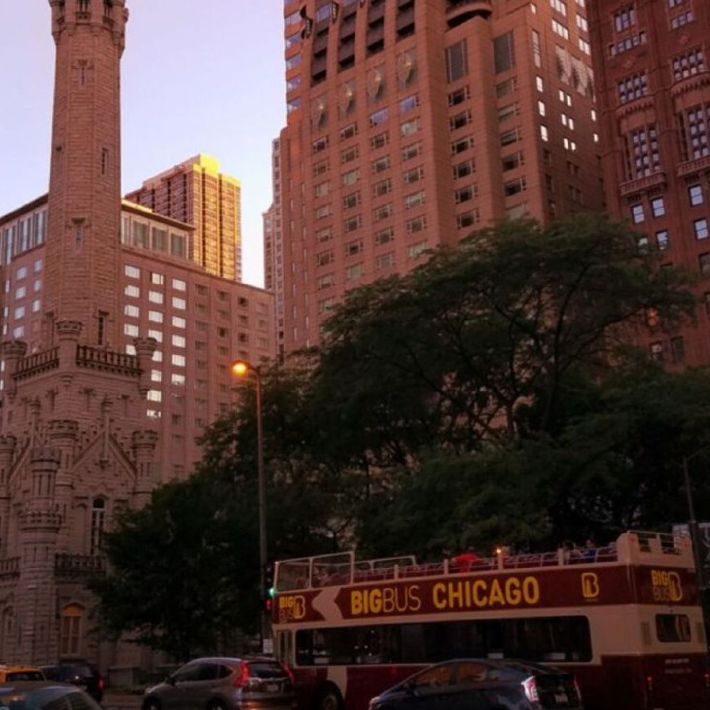 Bus at sunset in city