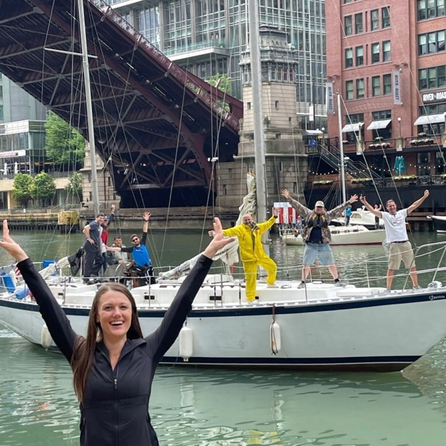 Woman in front of boat