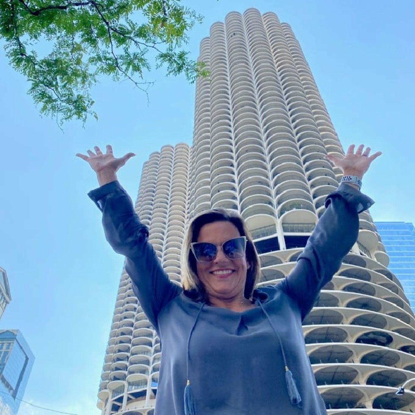 Woman in front of tower
