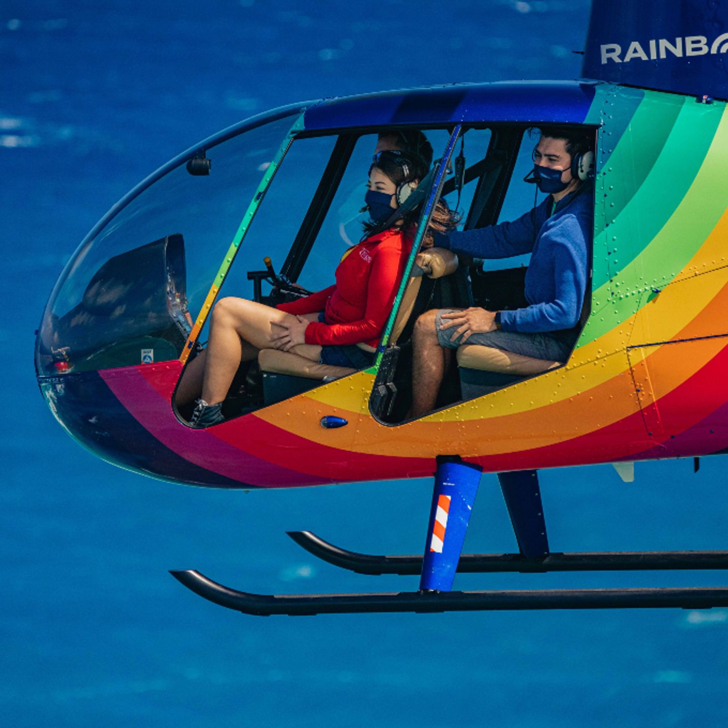 People in helicopter