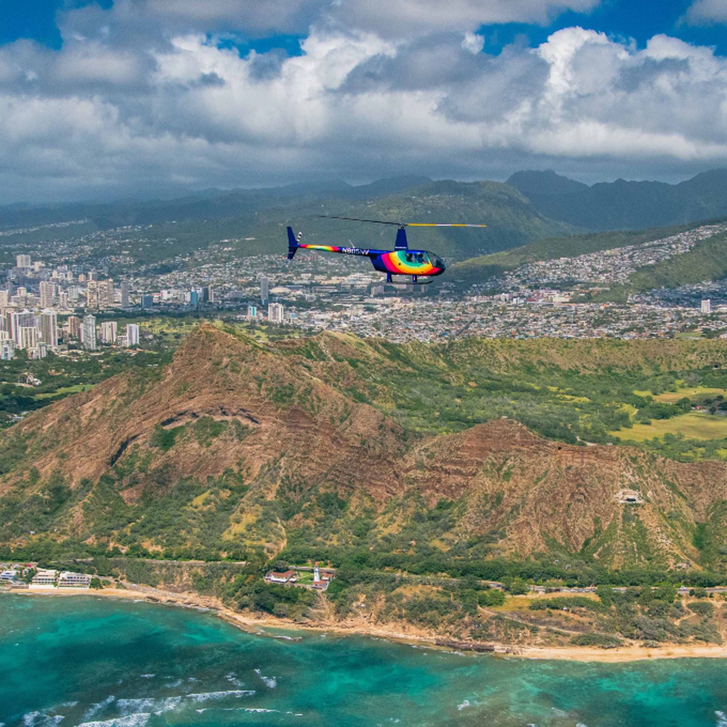 Helicopter flying over island