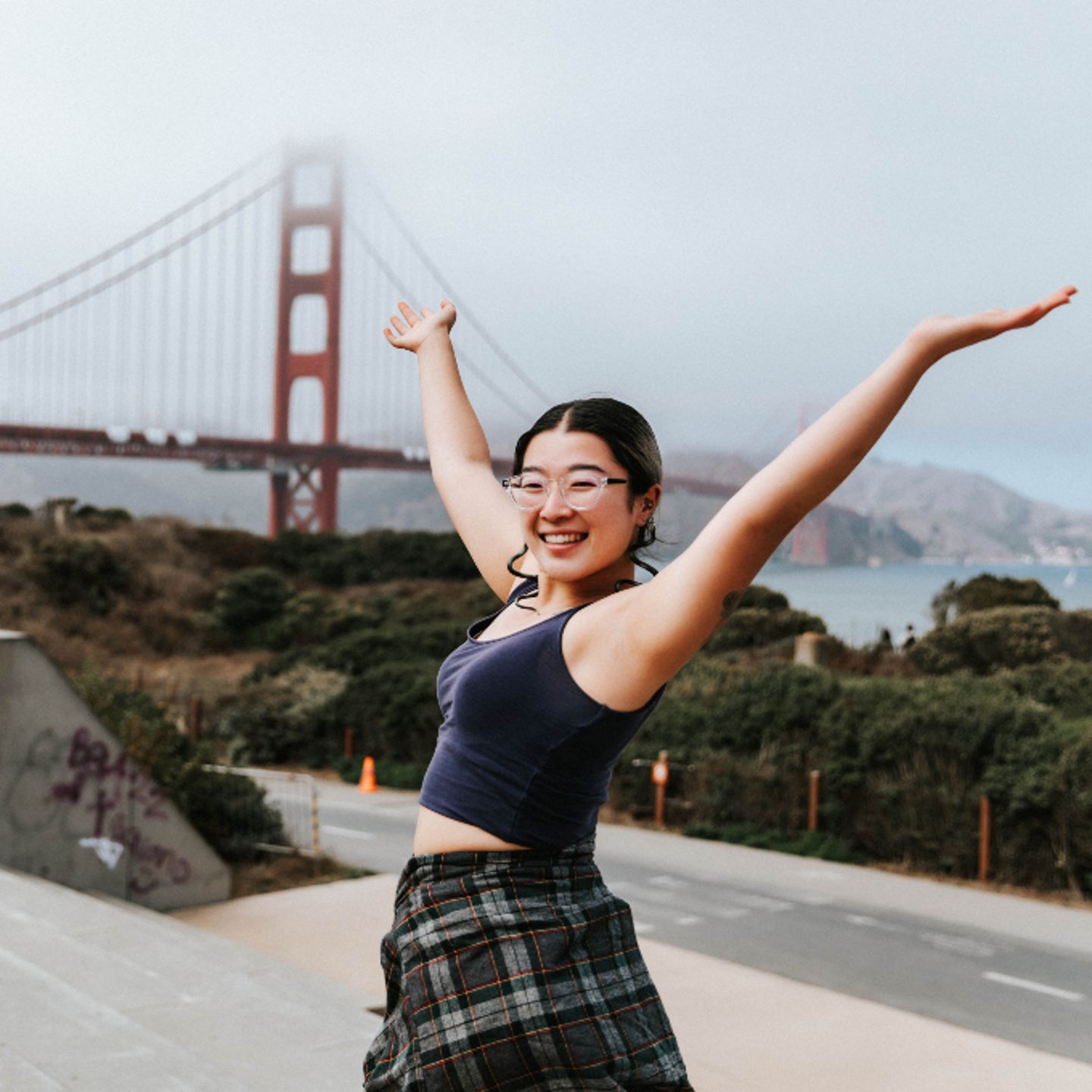 Woman in front of Golden Gate Bridge