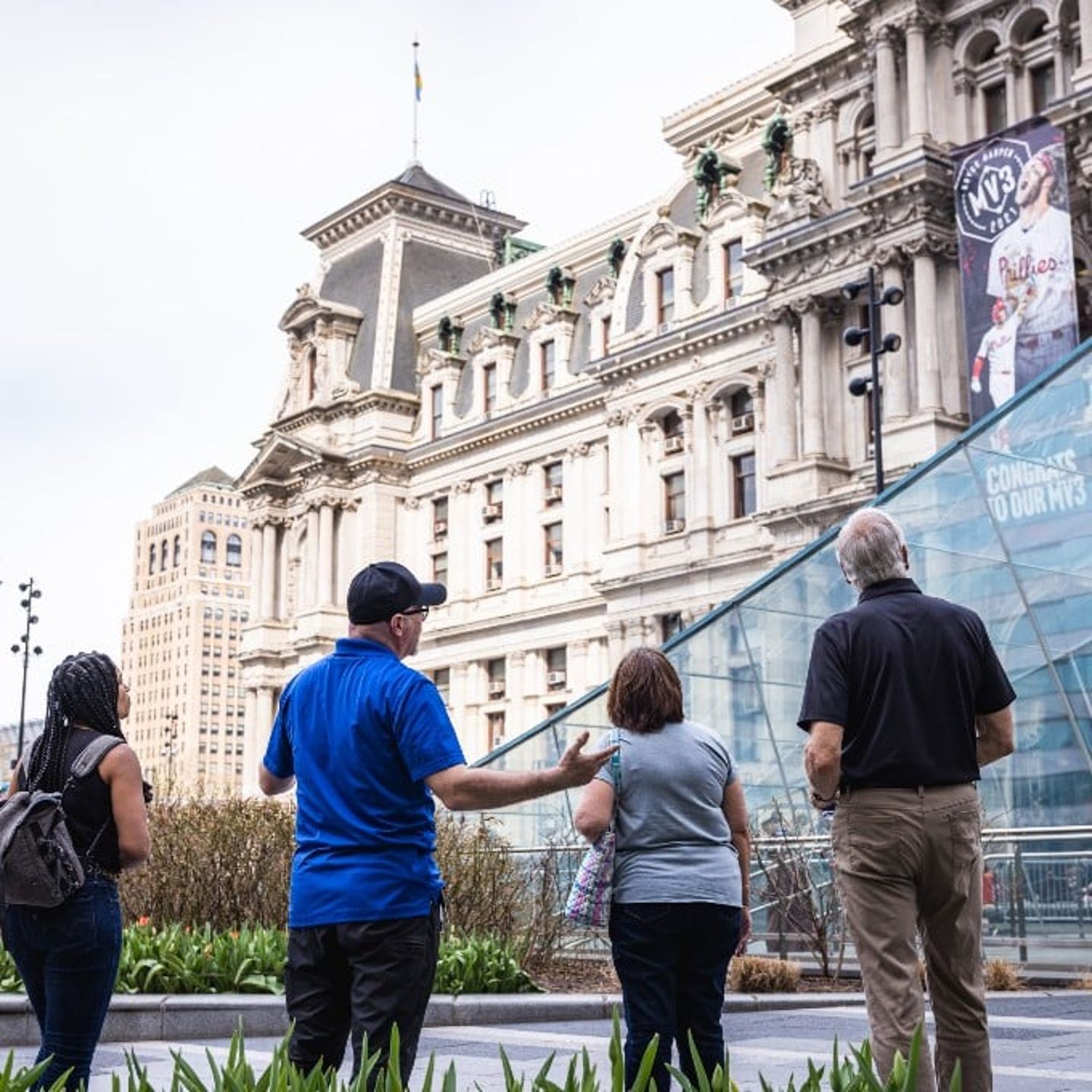 Group Looking at Building