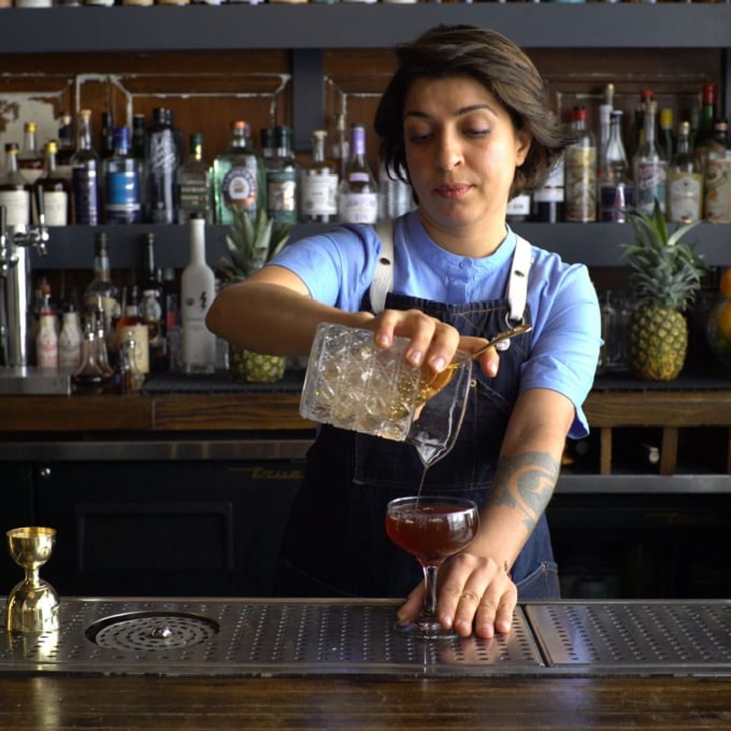 Person pouring drink