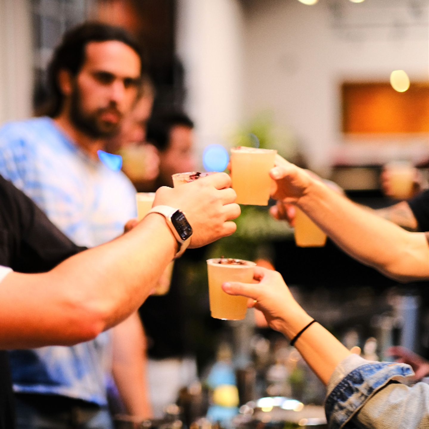 Group toasting cocktails