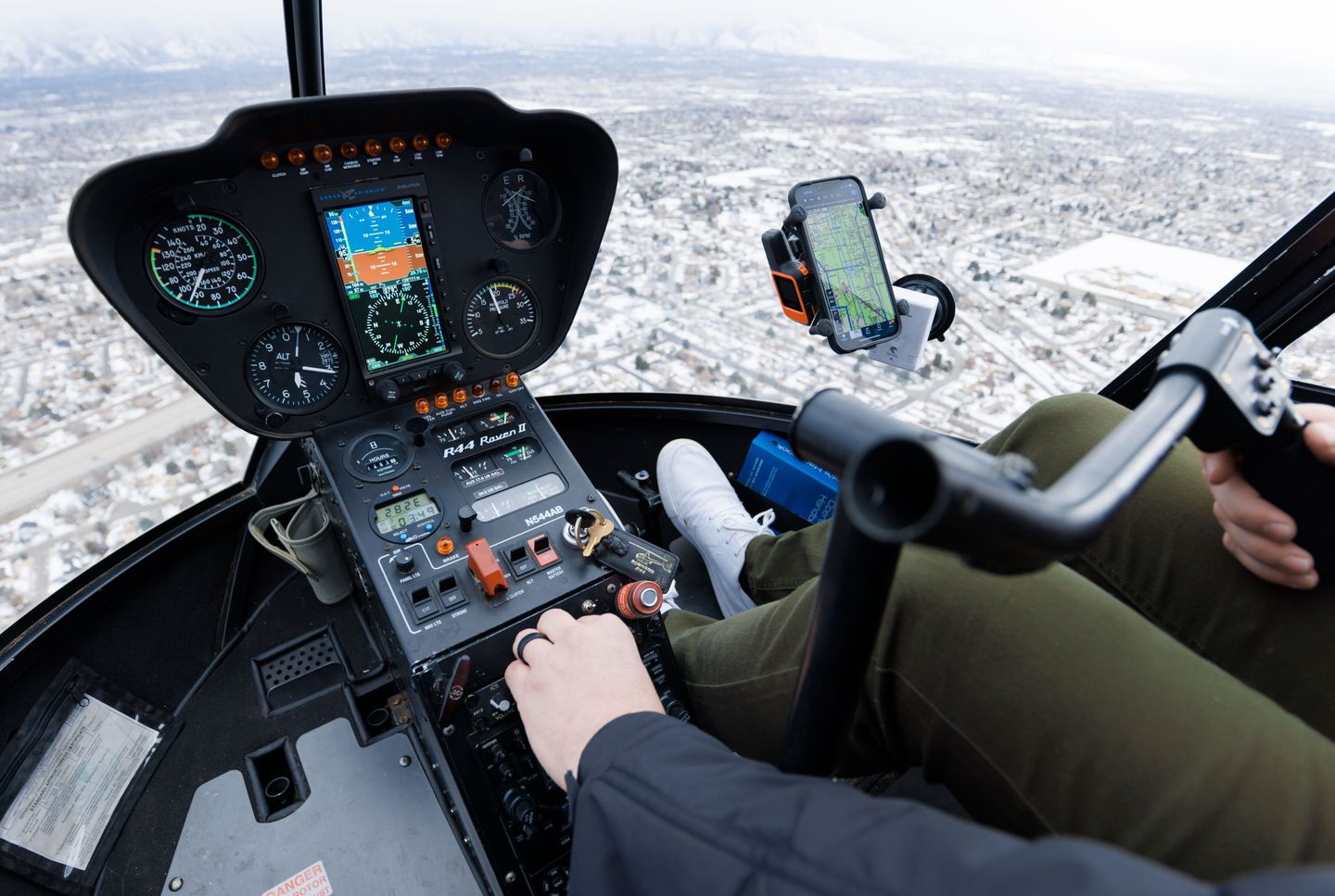People flying helicopter