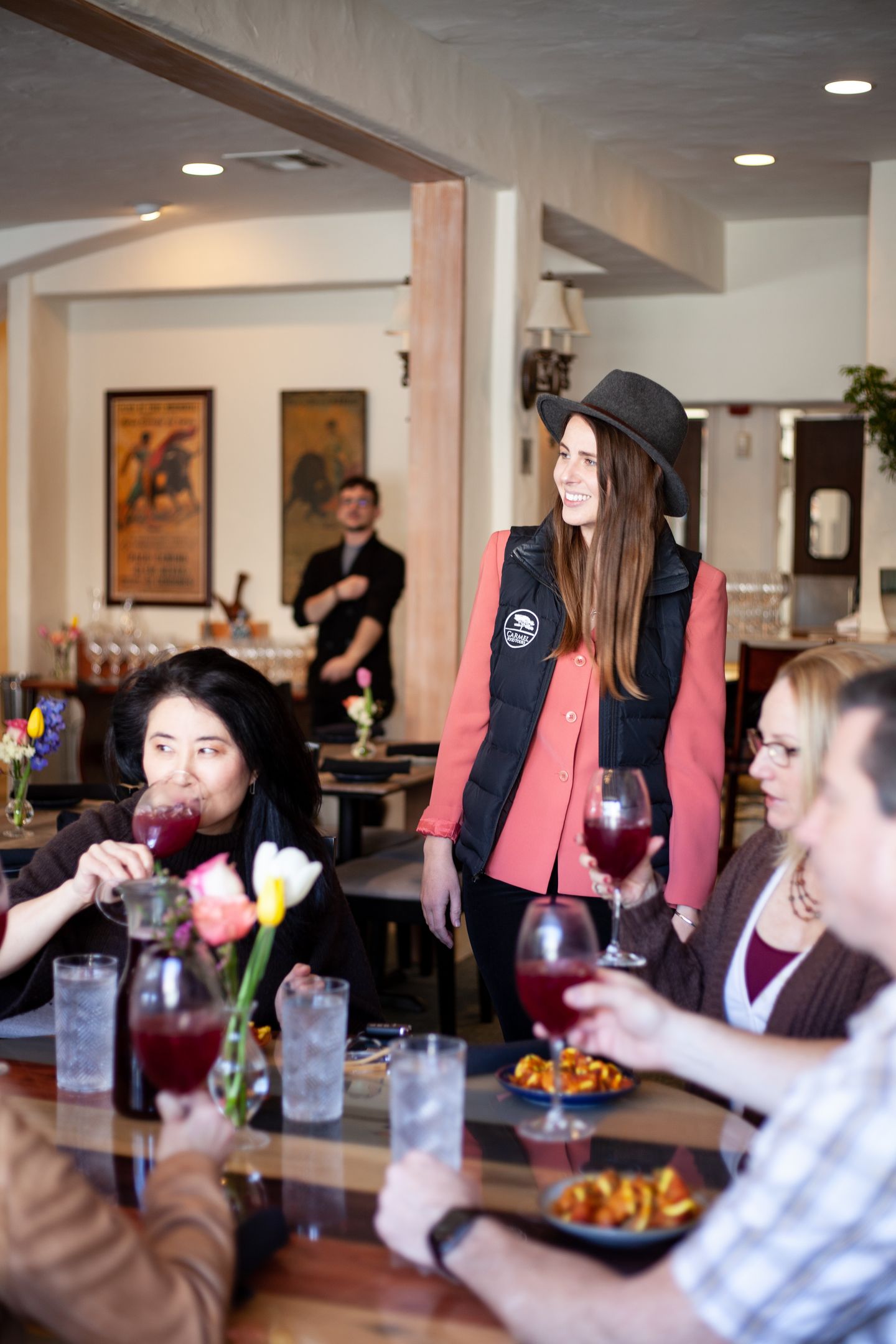 Group having food and wine