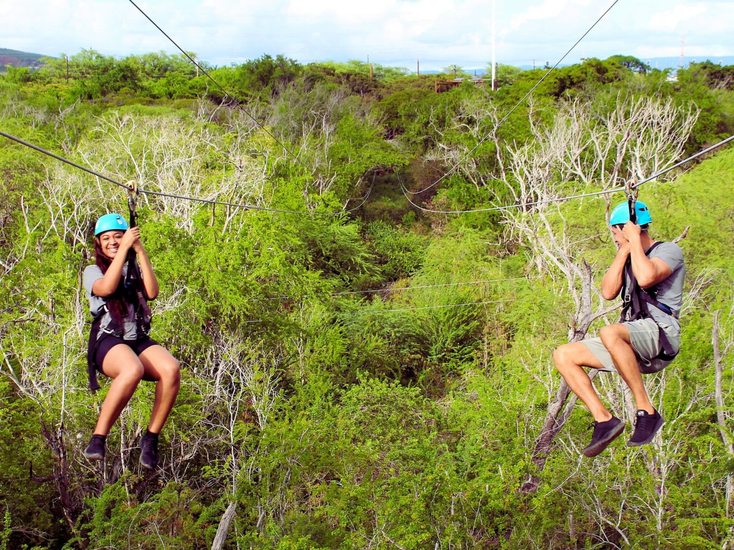 Two People Ziplining