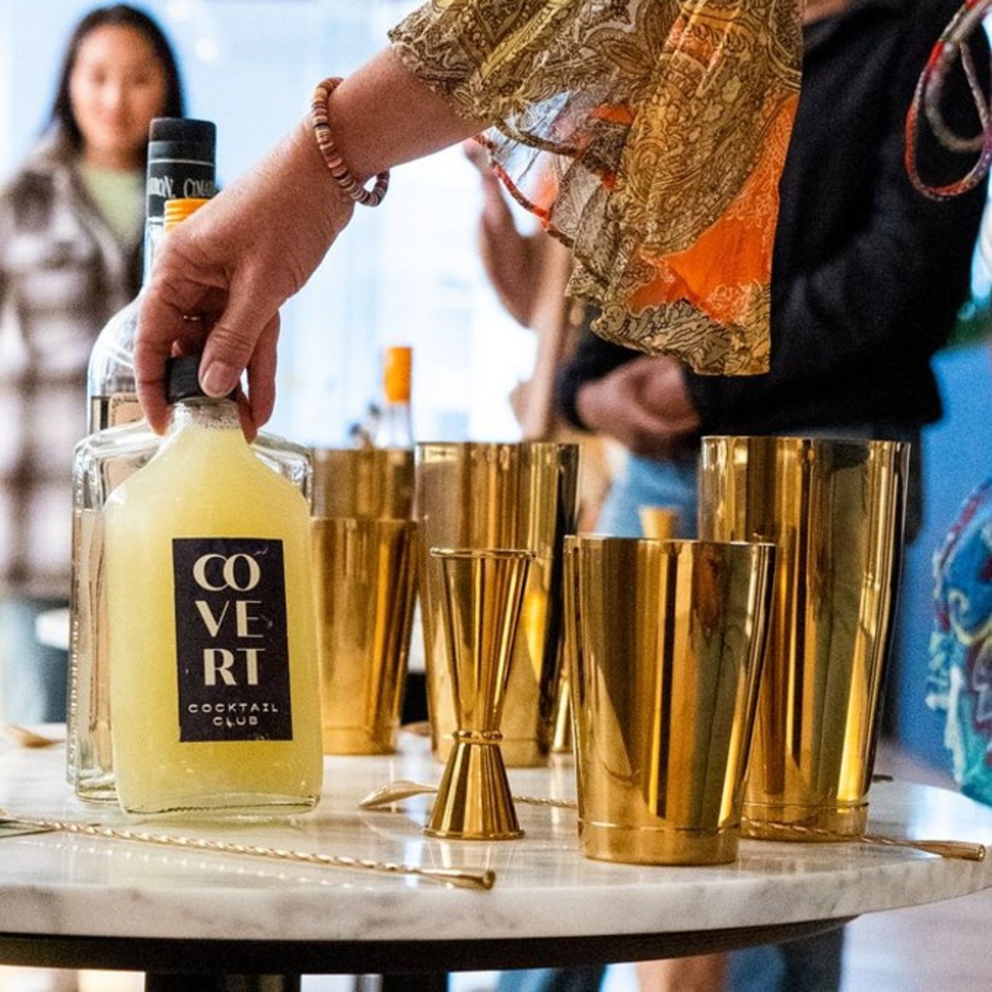 Bottle with mixer cups