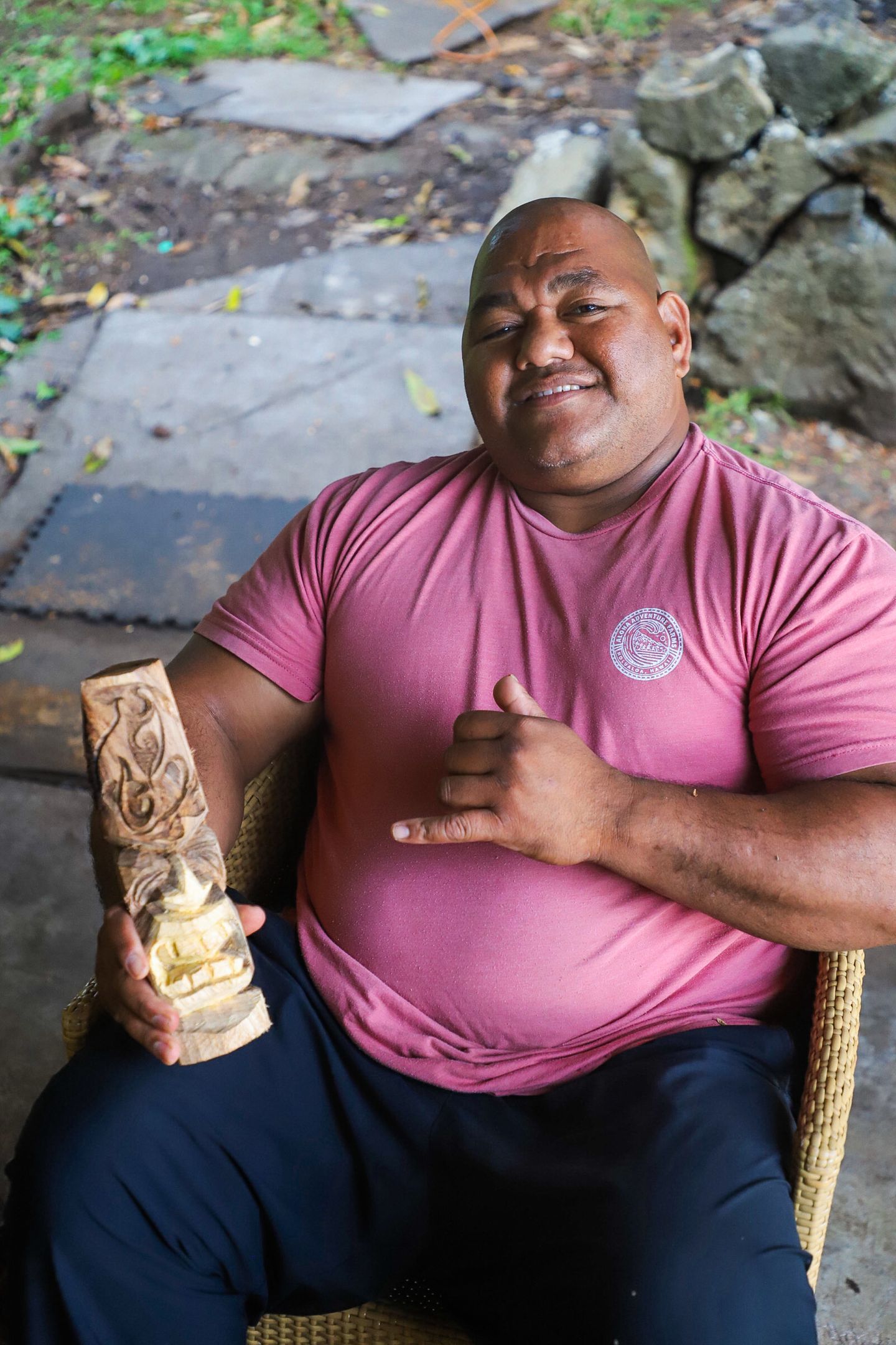 Man with Carved Wood Piece