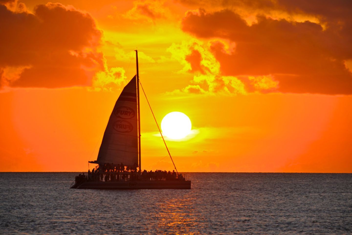 Sail boat at sunset