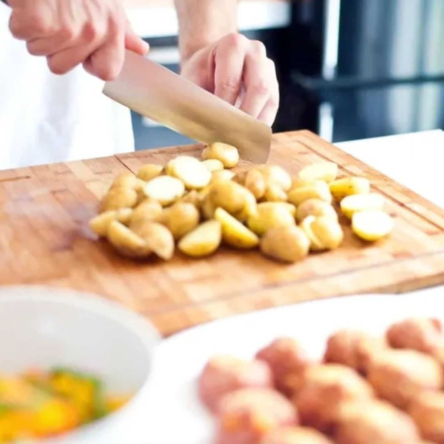 Person cutting vegetables